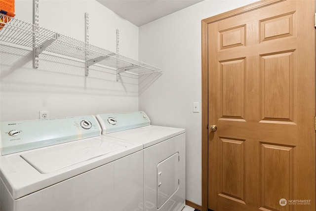 washroom featuring separate washer and dryer