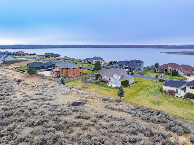 bird's eye view with a water view