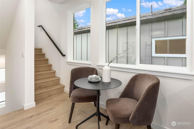 sitting room with light hardwood / wood-style flooring