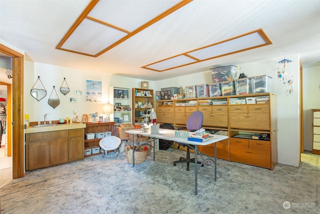 carpeted office featuring sink