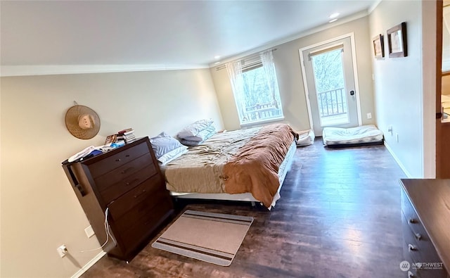 bedroom with access to outside, crown molding, and dark hardwood / wood-style flooring