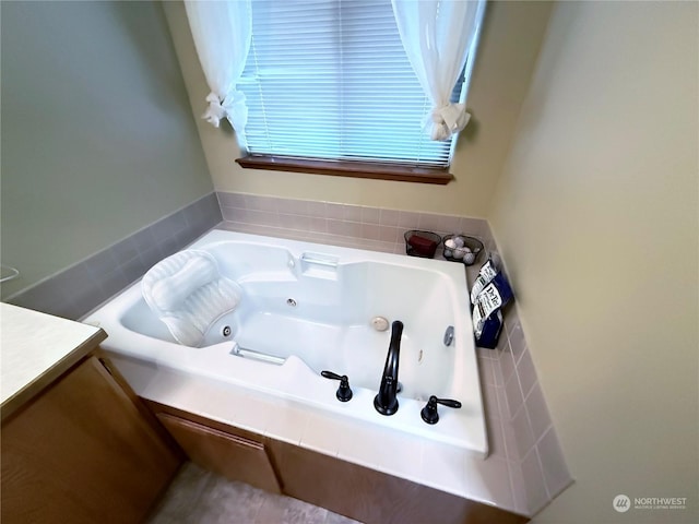 bathroom with a bathtub and vanity