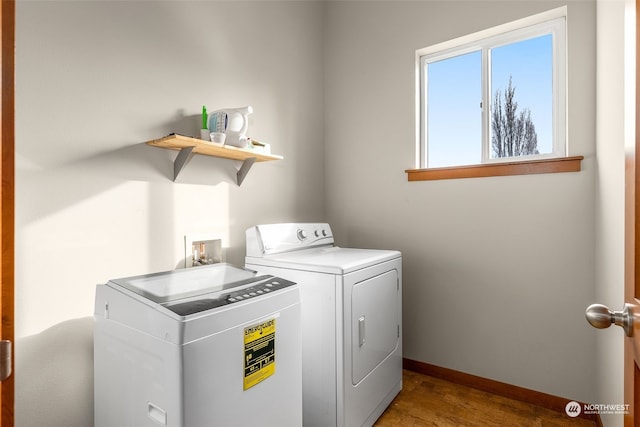 clothes washing area featuring washing machine and dryer