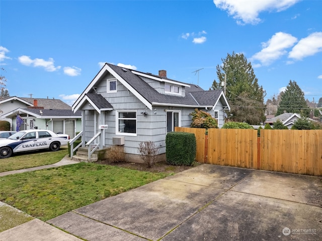 view of front of home with a front lawn