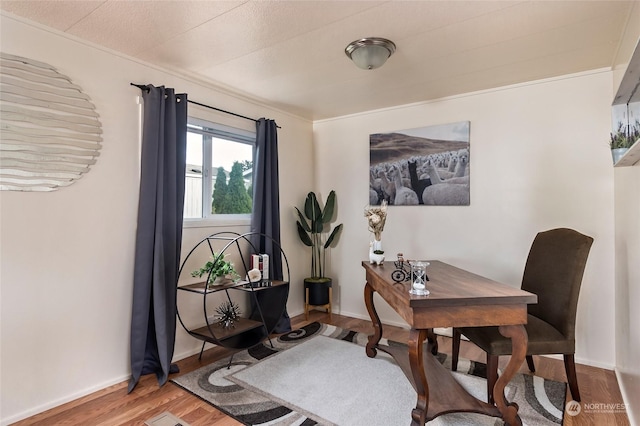 home office featuring hardwood / wood-style flooring