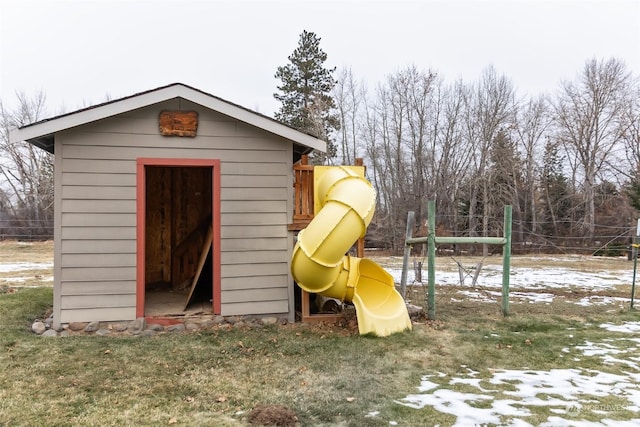 view of outbuilding with a playground