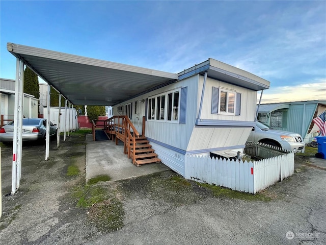 view of front of house with a carport