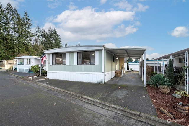 manufactured / mobile home with a carport