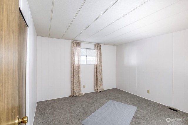 spare room with carpet flooring