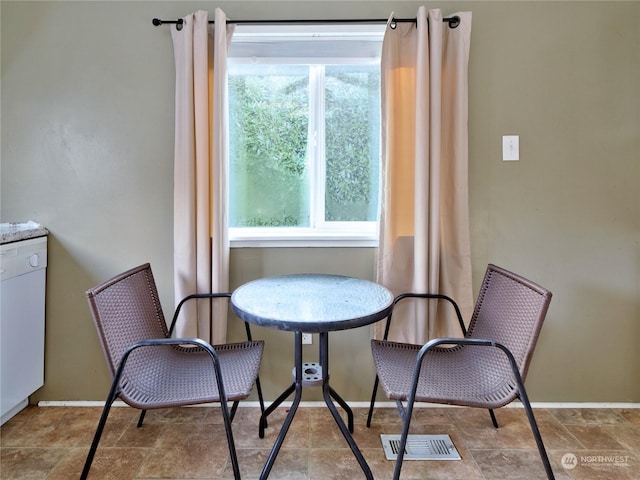 dining area with a wealth of natural light