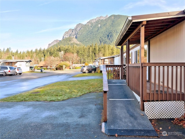 exterior space featuring a mountain view