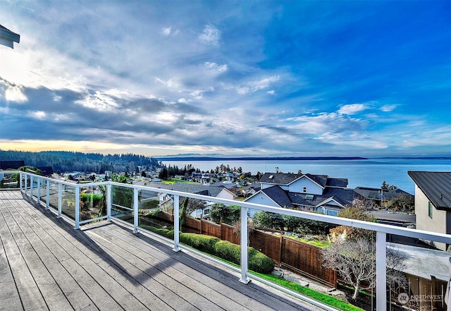 deck featuring a water view