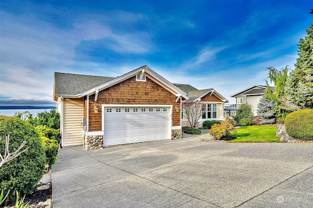 view of front of property featuring a garage