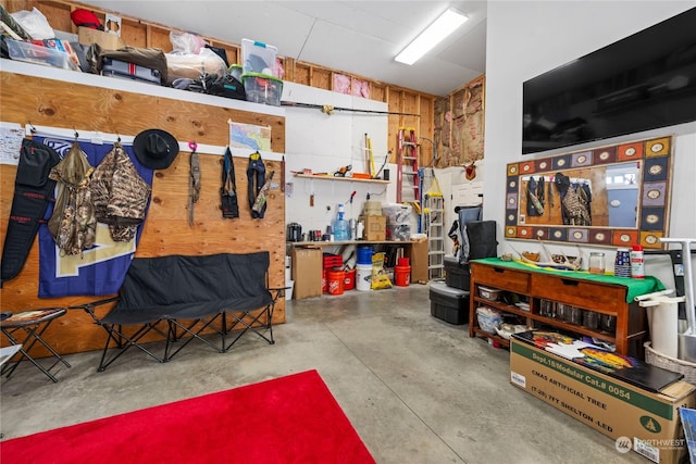 garage with a workshop area