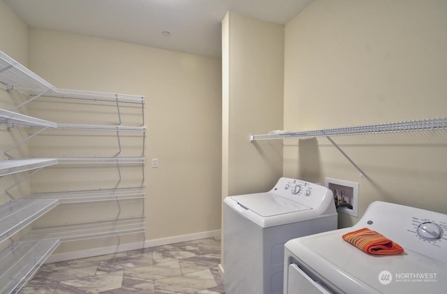 laundry area featuring washing machine and dryer