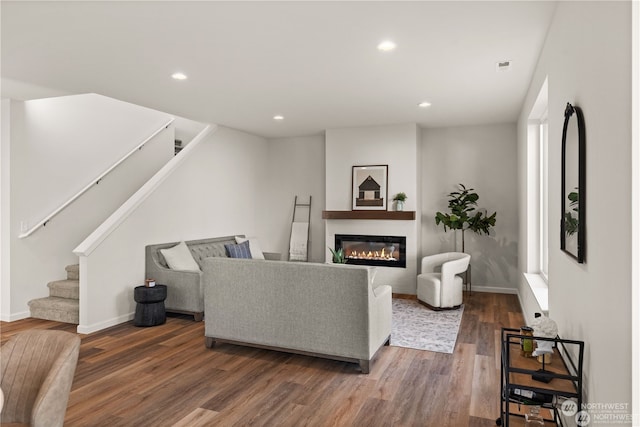 living room featuring dark wood-type flooring