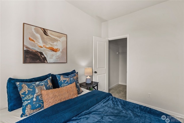 carpeted bedroom featuring a closet