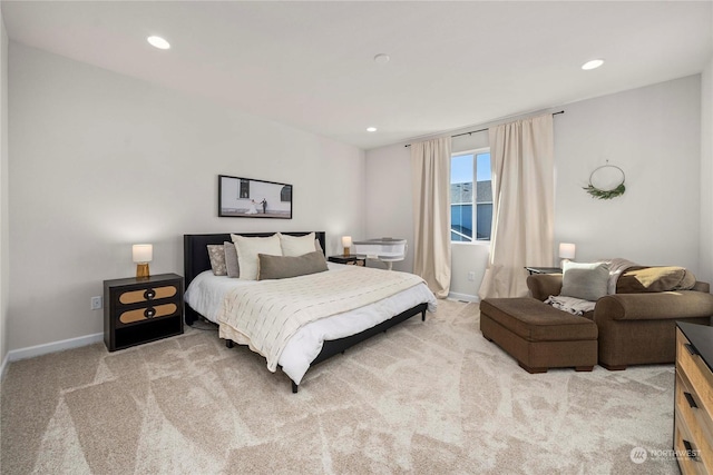 bedroom with light colored carpet