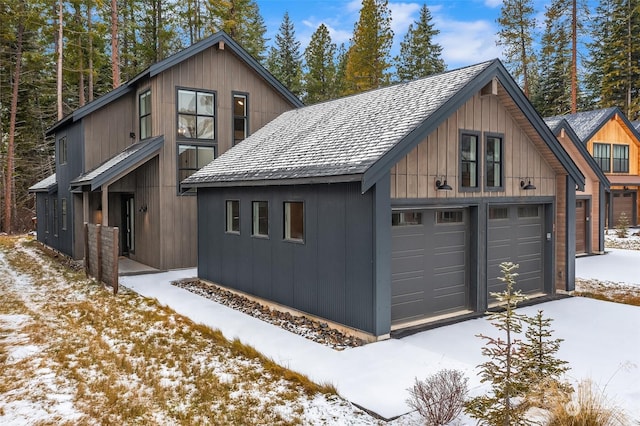 view of snow covered garage