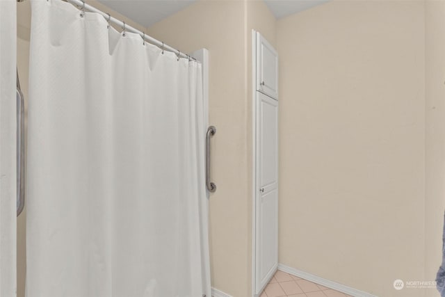 bathroom featuring tile patterned flooring