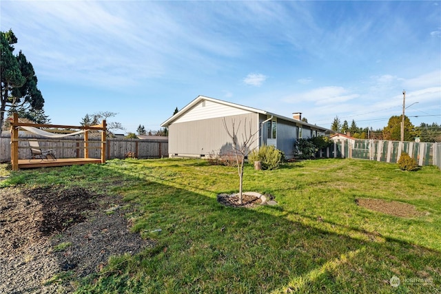 view of yard with a deck