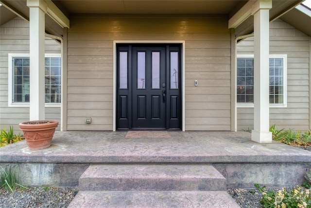 property entrance with a porch