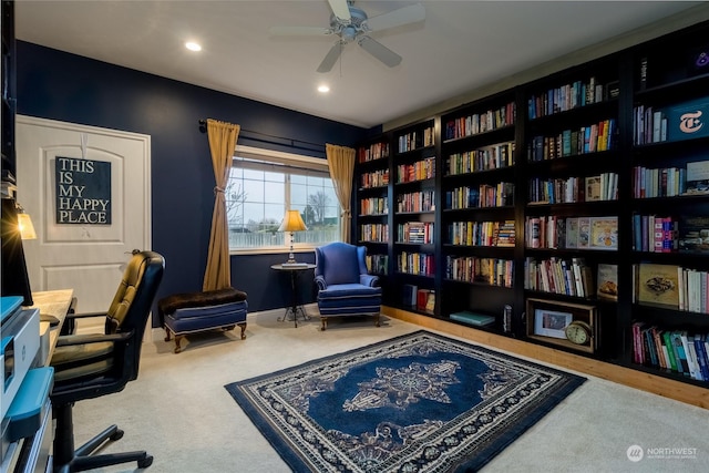 home office with ceiling fan and carpet floors