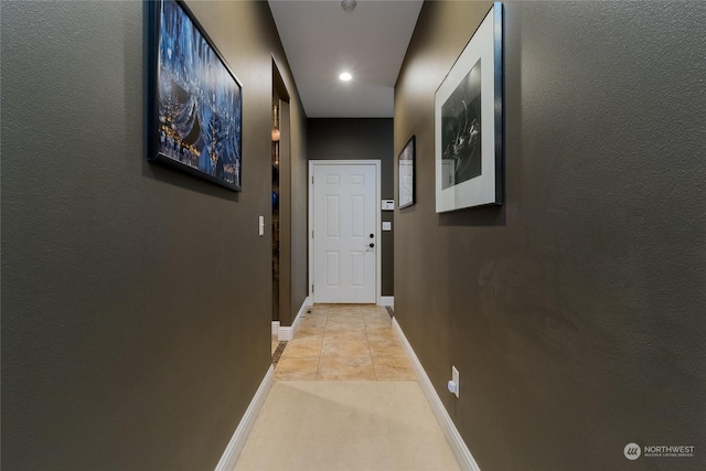 hallway with light tile patterned flooring