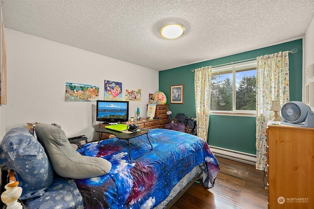 bedroom with baseboard heating, a textured ceiling, and dark hardwood / wood-style floors