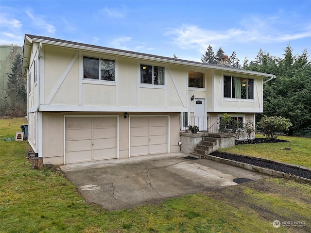 bi-level home with a front lawn and a garage