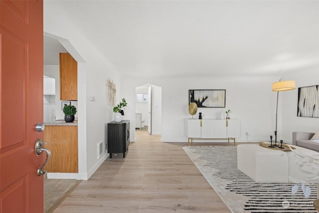 foyer entrance featuring light hardwood / wood-style floors