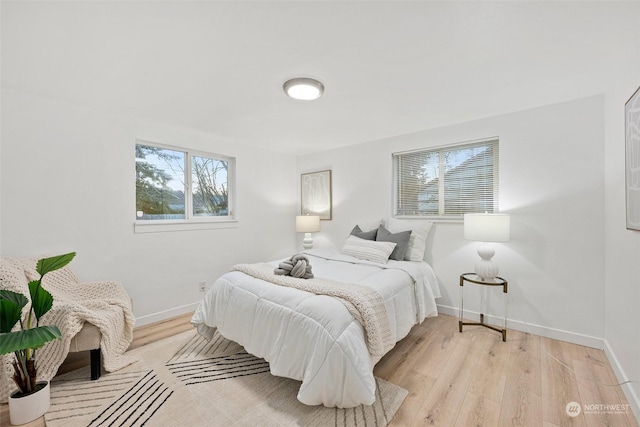 bedroom featuring light hardwood / wood-style flooring