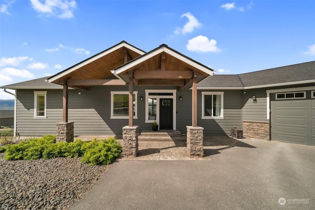 craftsman-style home featuring a garage