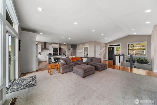 11 Holcomb Dr, East Wenatchee, WA 98802 - living area with recessed lighting, light colored carpet, vaulted ceiling, and baseboards