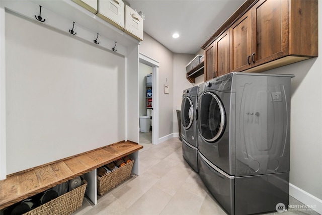 11 Holcomb Dr, East Wenatchee, WA 98802 - washroom with washing machine and dryer, cabinet space, baseboards, and recessed lighting