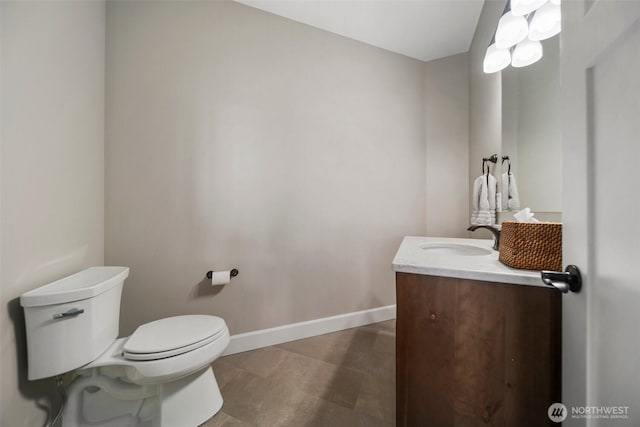 11 Holcomb Dr, East Wenatchee, WA 98802 - bathroom with toilet, vanity, and baseboards
