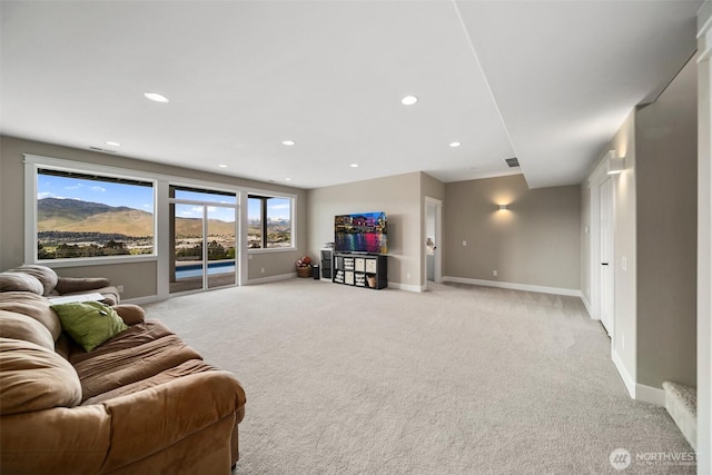 11 Holcomb Dr, East Wenatchee, WA 98802 - living area with light carpet, baseboards, and recessed lighting