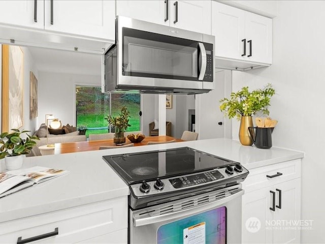 kitchen with white cabinets and stainless steel appliances