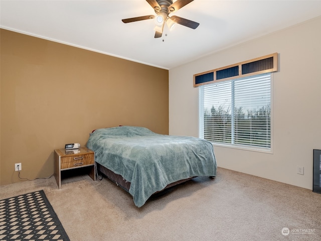 bedroom featuring carpet flooring and ceiling fan