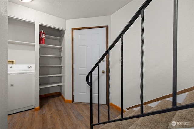 1305 W Clearbrook Unit 7, Bellingham, WA 98229 - stairway featuring washer / clothes dryer and wood finished floors