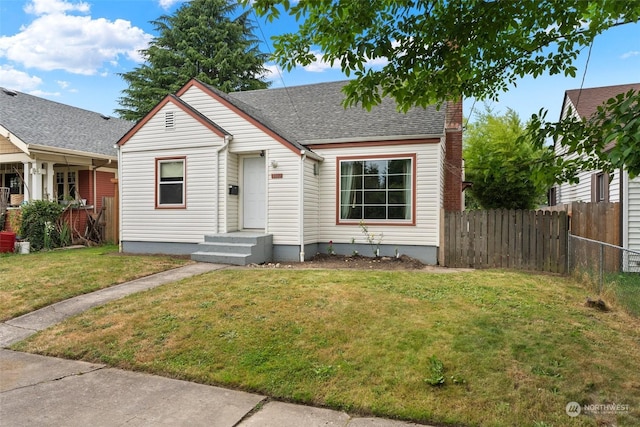 bungalow with a front lawn