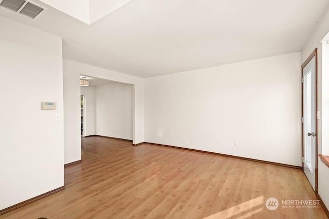 unfurnished room featuring light hardwood / wood-style flooring