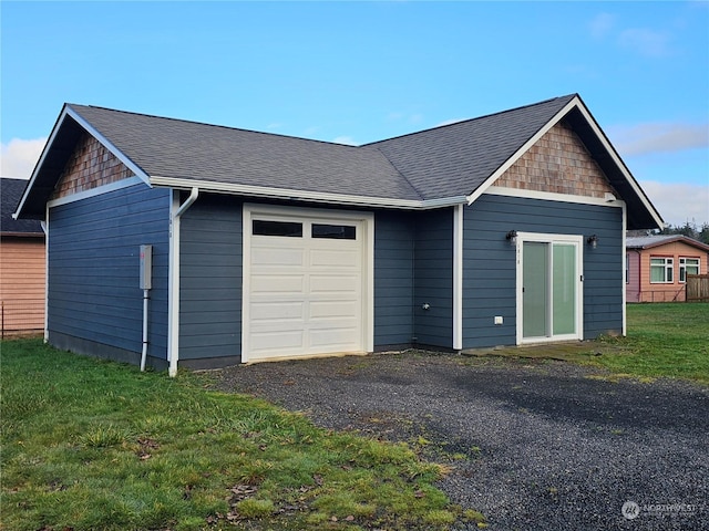 garage with a yard