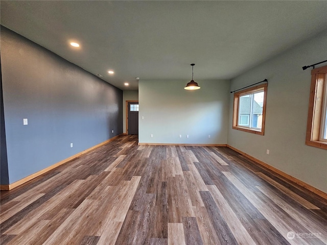 unfurnished room featuring wood-type flooring