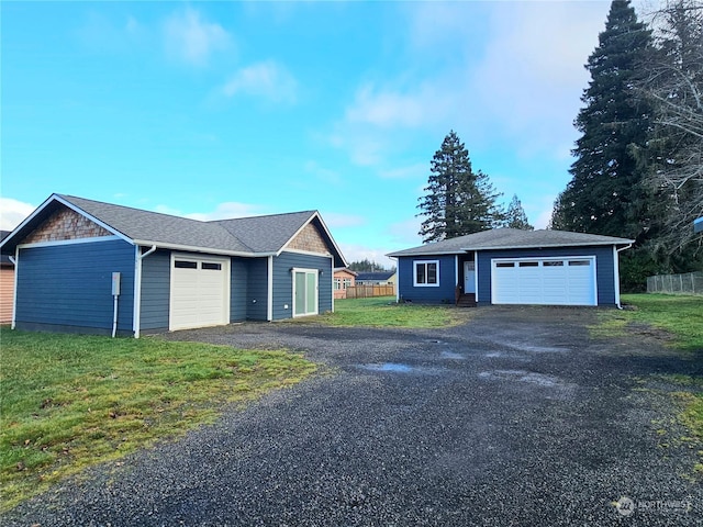 garage featuring a lawn