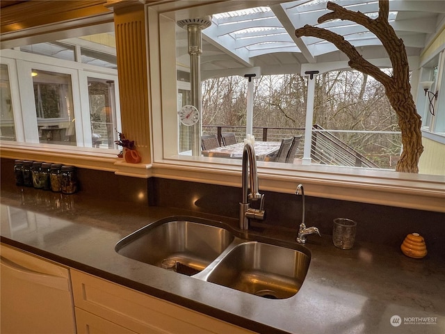 7251 Oak Bay Rd, Port Ludlow, WA 98365 - kitchen view of dishwasher and dark countertops