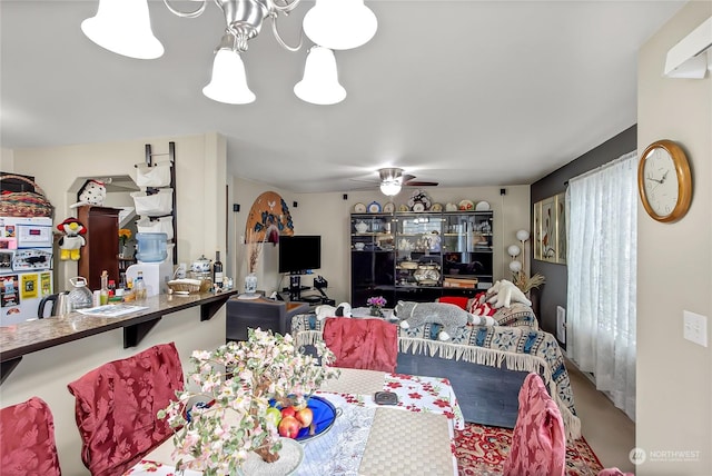 dining space featuring ceiling fan