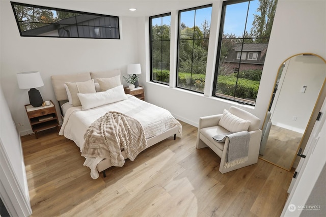 bedroom featuring light wood-type flooring