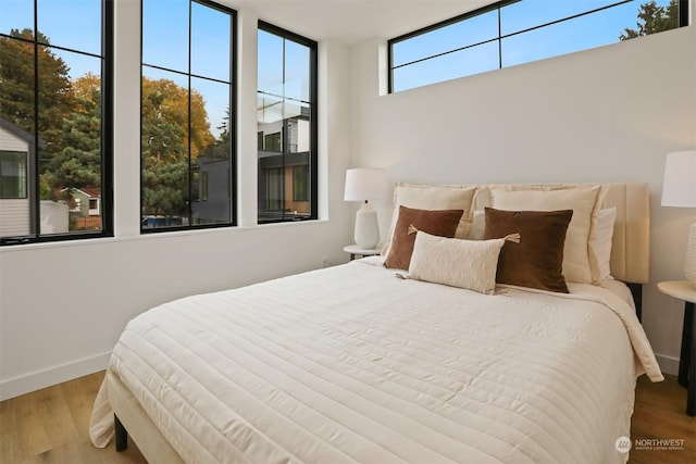 bedroom featuring hardwood / wood-style flooring