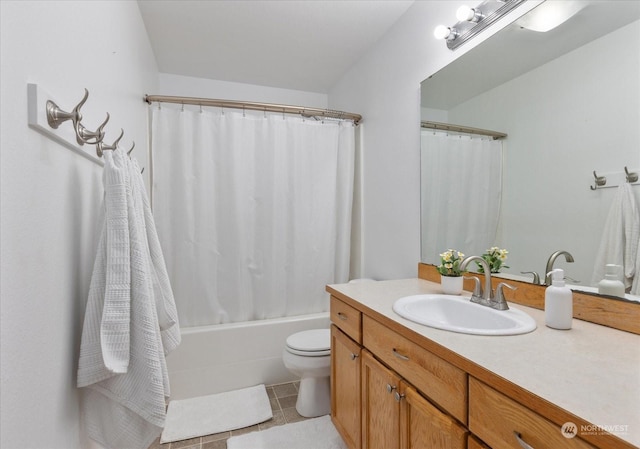 full bathroom featuring toilet, vanity, tile patterned floors, and shower / bathtub combination with curtain